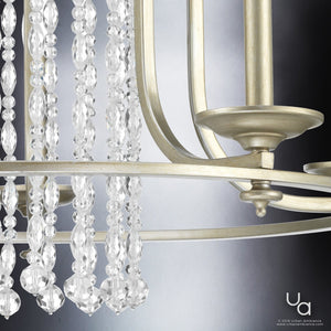 Close-up of the Urban Ambiance UHP2252 Mediterranean Chandelier from the Lexington Collection, featuring a metallic frame in an antique silver finish and hanging crystal strands, set against a gradient background.