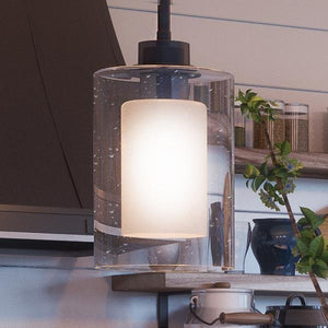 A unique and luxurious lighting fixture, the UHP2261 Contemporary Pendant Light from the Memphis Collection by Urban Ambiance hangs over a kitchen counter.