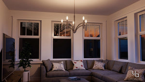A stunning living room with large windows and a gorgeous UHP2274 Modern Modern Chandelier, 15-5/8