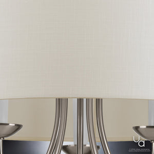 A close up of a beautiful Urban Ambiance UHP2280 Transitional Chandelier with a white shade.