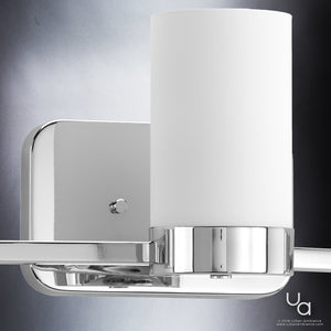 An UHP2292 Contemporary Bathroom Vanity Light with a gorgeous white cylinder.