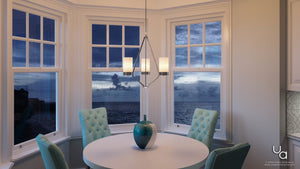 A beautiful dining room with a luxury lighting fixture.