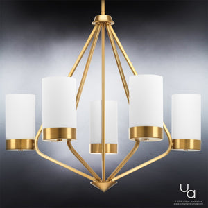 The Urban Ambiance UHP2301 Contemporary Chandelier from the Madison Collection features a brushed bronze finish and five cylindrical white etched glass shades suspended by angular gold arms, shown against a gradient gray background. Measuring 23″H x 27.375″W, this modern piece blends style and elegance for any contemporary space.