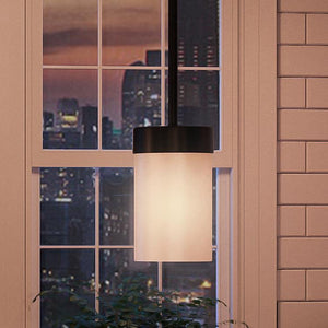 A window with a view of a city featuring the unique UHP2308 Transitional Pendant Light, Midnight Black Finish, Madison Collection by Urban Ambiance.