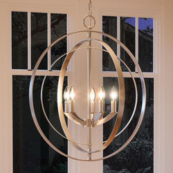 An UHP2326 Industrial Chic Chandelier, a stunning lighting fixture, hanging in front of a window.