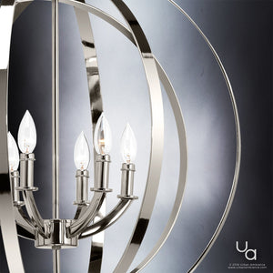 The UHP2328 Luxe Industrial Chandelier from Urban Ambiance’s Arezzo Collection features five candle-style lights encircled by intersecting silver rings in a polished nickel finish, set against a gradient gray background. The Urban Ambiance logo is visible in the bottom right corner.