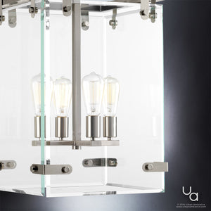 A luxurious lighting fixture, the UHP2443 Modern Farmhouse Narrow Chandelier, with three gorgeous bulbs.