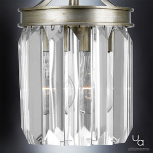 A luxury UHP2461 Crystal Pendant lighting fixture with a clear glass shade.