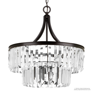 The Urban Ambiance UHP2462 Traditional Chandelier from the Lille Collection features a handcrafted design with a dark Olde Bronze frame and two tiers of prismatic glass prisms, elegantly suspended by a chain. Measuring 23-7/8″ high by 22-1/4″ wide, this modern fixture makes a striking statement in any space.