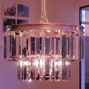 A unique UHP2468 Cosmopolitan Chandelier, from the Lille Collection by Urban Ambiance, is hanging in a room.