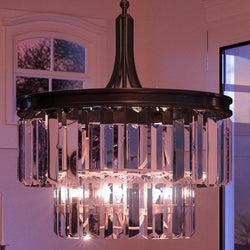An UHP2469 Cosmopolitan Chandelier, 19" x 16-1/4", Olde Bronze Finish, Lille Collection by Urban Ambiance showcasing a gorgeous and unique lamp