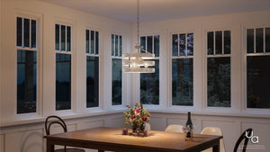 A dining room with a beautiful UHP2471 Modern Farmhouse Chandelier, 13-1/2
