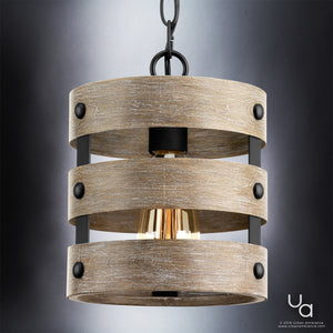 Illuminate your space with the UHP2472 Modern Farmhouse Pendant from the Adelaide Collection by Urban Ambiance. Measuring 10″ high by 8-1/2″ wide and finished in charcoal, this pendant showcases an open cage lighting design with three wood-like bands and bold black metal accents. The exposed bulb suspended by a chain brings rustic modern charm and industrial-inspired chandelier style to any room.
