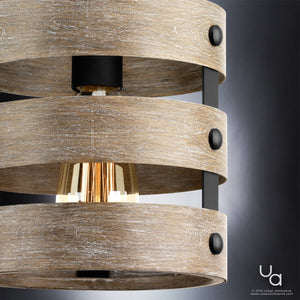 Close-up of the Urban Ambiance UHP2472 Modern Farmhouse Pendant from the Adelaide Collection, showcasing its wooden rings, charcoal-finished metal accents, and exposed bulb design against a dark gray background.