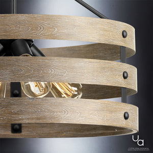 Close-up of the Urban Ambiance UHP2474 Modern Farmhouse Chandelier from the Adelaide Collection, featuring wooden circular bands, exposed bulbs, and black metal accents in a charcoal finish against a dark gradient background—showcasing the elegant charm of industrial rustic lighting design.
