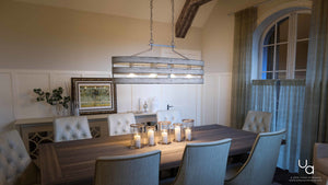 A unique dining room featuring a UHP2477 Modern Farmhouse Chandelier, 17