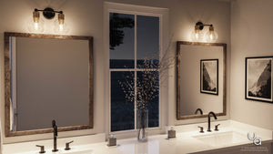 Modern bathroom with two sinks, framed mirrors, and wall lights from the Urban Ambiance Belfast Collection (UHP2500 Vintage Industrial Bath Fixture, Olde Bronze Finish) featuring elegant globe glass. The space includes a window with a night view, a vase with branches, and two black-and-white landscape photos on the wall.