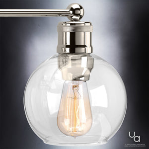 A UHP2503 Vintage Bath Fixture with a glass globe, offering beautiful lighting in a luxurious Polished Nickel Finish from the Belfast Collection by Urban Ambiance.
