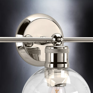A beautiful Urban Ambiance UHP2503 Vintage Bath Fixture with a clear glass bulb.