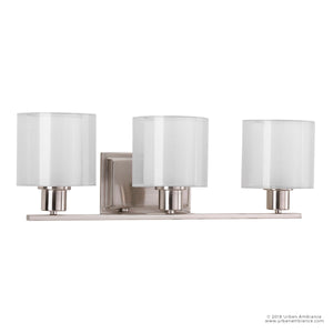 Three gorgeous UHP2512 Cosmopolitan Bathroom Vanity Light fixtures with white shades.