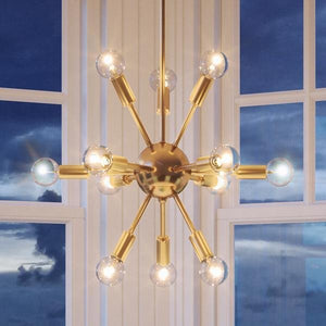A stunning Urban Ambiance UHP2521 Modern Chandelier, 22"H x 14-1/8"W, Brushed Bronze Finish from the Baltimore Collection in front of a window.