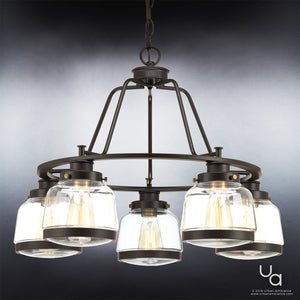 The Urban Ambiance UHP2531 Luxe Industrial Chandelier from the Nottingham Collection showcases a round, black metal frame in an Olde Bronze finish, measuring 19.25 inches high by 26 inches wide. Five glass shades with visible bulbs are suspended by a chain, set against a gradient background.