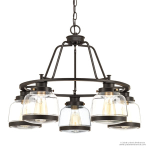 The Urban Ambiance UHP2531 Luxe Industrial Chandelier from the Nottingham Collection features an Olde Bronze finish and measures 19.25 inches high by 26 inches wide; it hangs from a short chain and showcases six globe glass shades with exposed bulbs, combining classic elegance with schoolhouse charm.