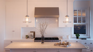 A white kitchen with a beautiful Urban Ambiance UHP2534 Industrial Chic Pendant Light, 11