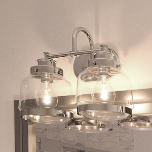 A gorgeous bathroom with a mirror and two Urban Ambiance UHP2536 Industrial Chic Bathroom Vanity Lights, 11.25"H x 16.25"W, Polished Nickel Finish,