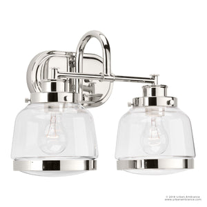 Two gorgeous lighting fixtures from the Nottingham Collection by Urban Ambiance, with clear glass bulbs.