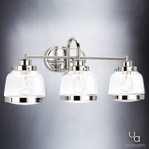 Three beautiful UHP2538 Industrial Chic Bathroom Vanity Lamps with clear glass shades.