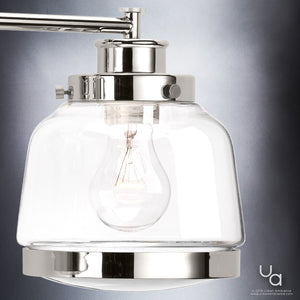 A unique UHP2538 Industrial Chic Bathroom Vanity Light with a glass shade and a light bulb.