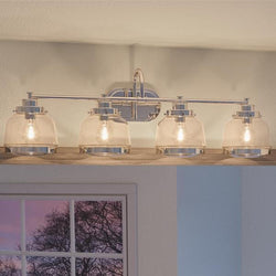 An Urban Ambiance UHP2540 Industrial Chic Chic Bathroom Vanity Light, 11.25"H x 35.75"W, with a Polished Nickel Finish and four glass shades from the Nottingham