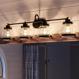 An Urban Ambiance luxury lighting fixture, the UHP2541 Industrial Chic Bathroom Vanity Light, features a unique design with three glass jars, measuring 11.25"H x 35.75"W