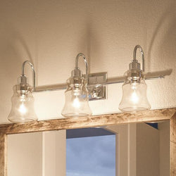 A bathroom with three unique lighting fixtures, UHP2553 Vintage Bathroom Vanity Lights, 9.25"H x 24.375"W, Polished Chrome Finish, Columbus Collection by Urban Ambiance