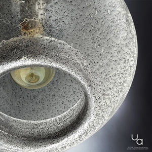 Close-up of the UHP2580 Vintage Pendant from Urban Ambiance’s Birmingham Collection, showcasing its textured artisan glass shade and visible lightbulb inside. The fixture features a charcoal finish and measures 14″ high by 11-3/4″ wide. The Urban Ambiance logo and website are displayed in the bottom right corner.