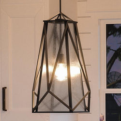 A unique and gorgeous Urban Ambiance UHP2590 Contemporary Chandelier, 19.75"H x 12"W, Charcoal Finish from the Seattle Collection hanging over a kitchen counter.