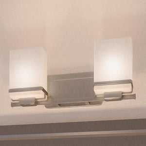 A unique UHP2600 Transitional Bathroom Vanity Light from the Modena Collection by Urban Ambiance with two glass shades.