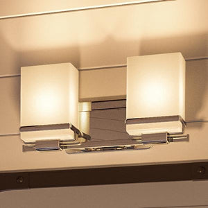 A Unique Urban Lighting Fixture - The Modena Collection Vanity Light in Polished Chrome, 6.5"H x 13"W with two lights.