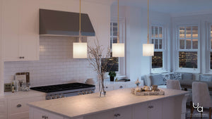 A beautiful kitchen with luxurious white cabinets and a stunning view of the city, complete with Urban Ambiance's UHP2633 Cosmopolitan Pendant.