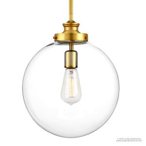 Make a modern lighting statement with the Urban Ambiance UHP2645 Vintage Pendant from the Glasgow Collection. Featuring a clear glass globe and native brass finish, this pendant light showcases an exposed filament bulb elegantly suspended from a sleek gold rod. Measures 15″ high by 12″ wide.