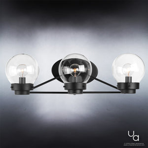 The Urban Ambiance UHP2707 Contemporary Bathroom Vanity Light from the Aberdeen Collection features a midnight black metal finish and three clear glass globe shades with exposed bulbs, shown mounted against a gradient gray background.