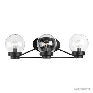 Illuminate your bathroom with the UHP2707 Contemporary Bathroom Vanity Light from Urban Ambiance’s Aberdeen Collection. Measuring 6.5″ high by 22″ wide, this midnight black fixture features three clear glass globe shades with exposed bulbs mounted on a horizontal base, adding a modern touch of contemporary flair to your bath lighting.