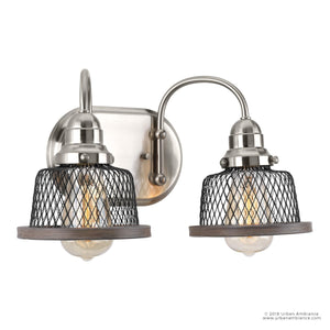 The UHP2720 Vintage Bathroom Vanity Light from Urban Ambiance’s Eugene Collection features dual metal mesh shades, exposed bulbs, a brushed nickel finish, and wooden accents mounted on a rectangular backplate—infusing any space with vintage-inspired industrial character.