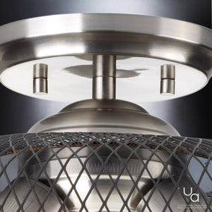 Close-up of the Urban Ambiance UHP2732 Vintage Ceiling Fixture from the Eugene Collection, showcasing its brushed nickel finish and mesh-covered design, mounted on a circular base against a neutral background; measures 10.25″ high by 16″ wide.