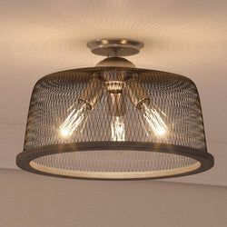 An UHP2732 Vintage Ceiling Fixture with a unique metal mesh shade, from the Urban Ambiance Eugene Collection.