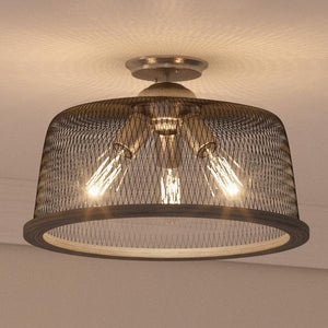 An UHP2732 Vintage Ceiling Fixture with a unique metal mesh shade, from the Urban Ambiance Eugene Collection.