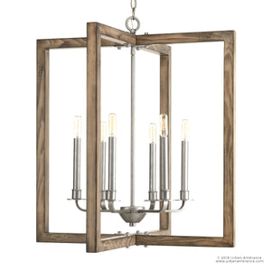 The Urban Ambiance UHP2741 Modern Farmhouse Chandelier from the Brighton Collection showcases six candle-style bulbs and a geometric wooden outer frame paired with a galvanized steel finish. Measuring 28-3/4 inches high by 26 inches wide and suspended by a chain, this chandelier adds warmth, character, and sophisticated charm to any space while blending contemporary elegance with rustic appeal.