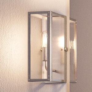 An Urban Ambiance UHP2750 Industrial Chic Electric Bath / Wall Light, 12"H x 5-1/4"W, Stainless Steel Finish, Messina Collection with a unique light bulb
