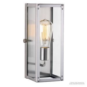 The UHP2750 Luxe Industrial Electric Bath / Wall Light by Urban Ambiance features a rectangular stainless steel frame and clear enclosure with an exposed Edison-style bulb, mounted vertically. Part of the Messina Collection, this 12″H x 5-1/4″W modern bath fixture showcases sleek lines and quality craftsmanship—an ideal choice for contemporary spaces.